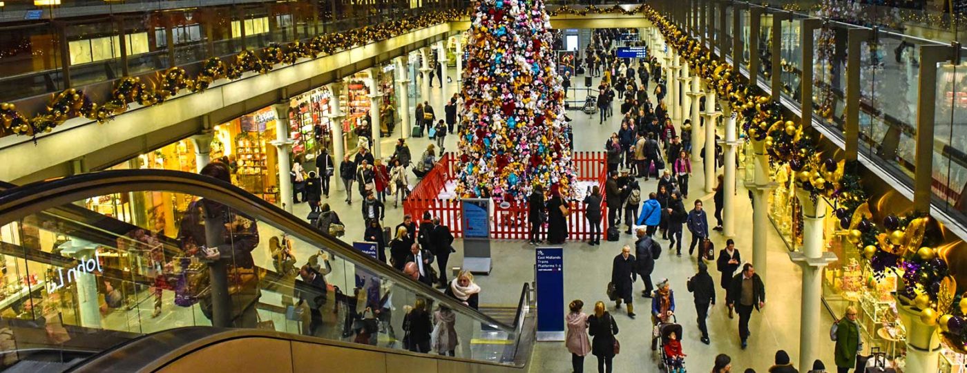 busy holiday mall with shoppers