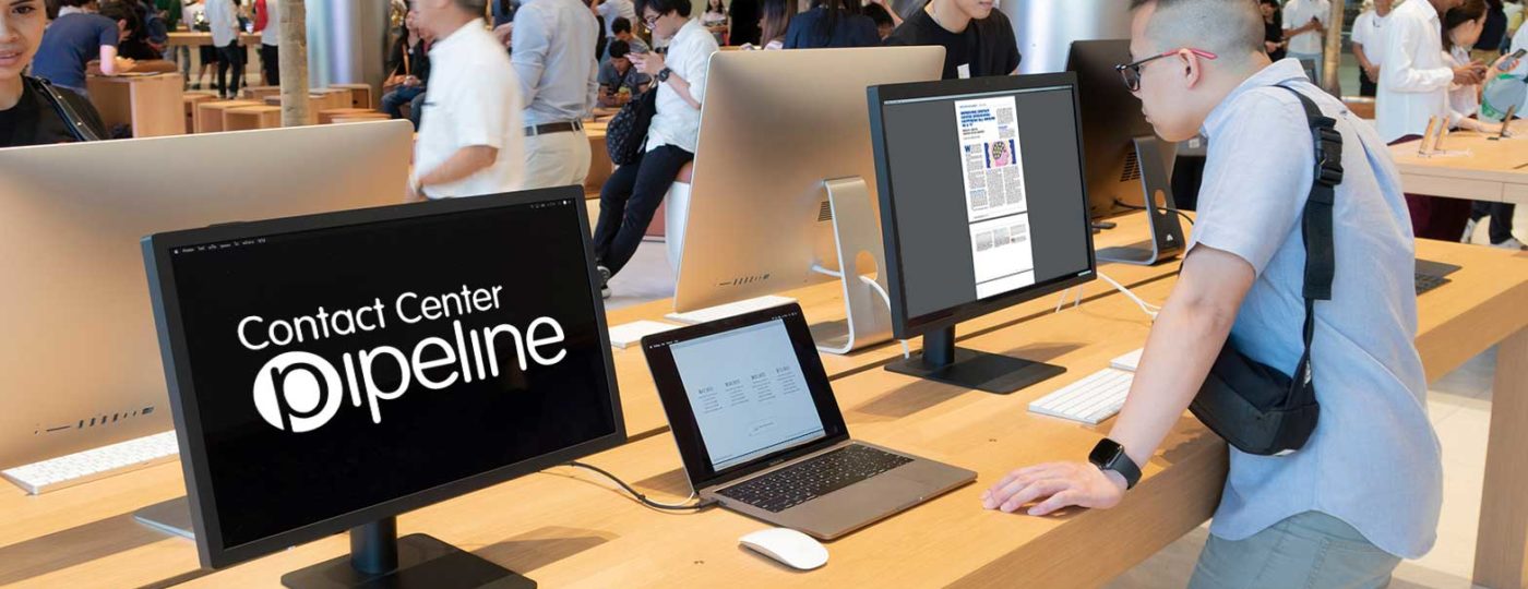 people inside technology store man looking at contact center article