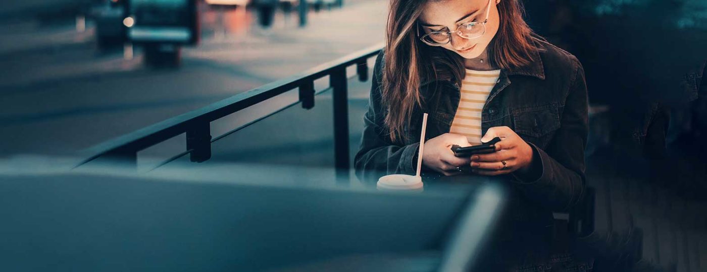engaged woman on her smartphone
