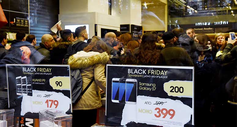 people at a retail store on black Friday cyber Monday