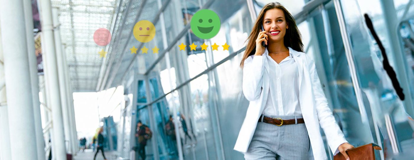 woman talking on the phone on her way out of the airport