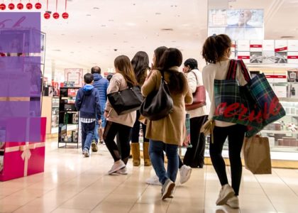 people shopping at retail store during black Friday Cyber Monday Sales will increase retail customer care demand