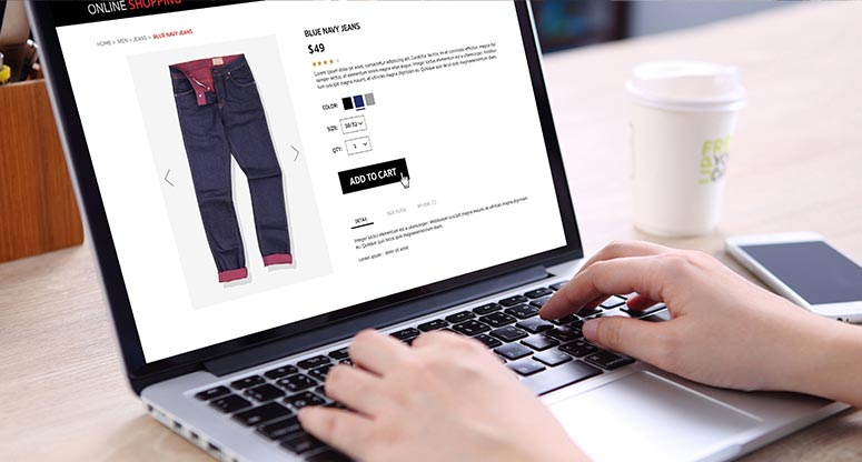 person doing online shopping adding pants to cart