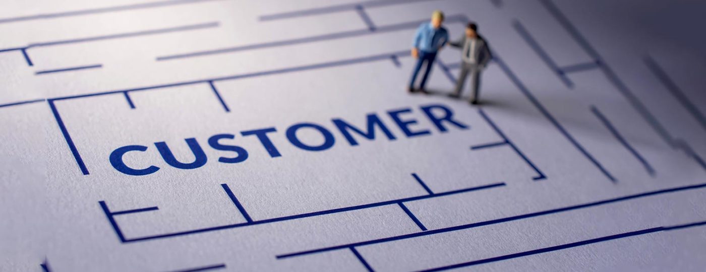 business men with the word customer in the center like on demand contact center solutions