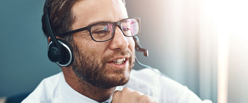 Competent customer service representative chats with client to solve solutions in healthcare